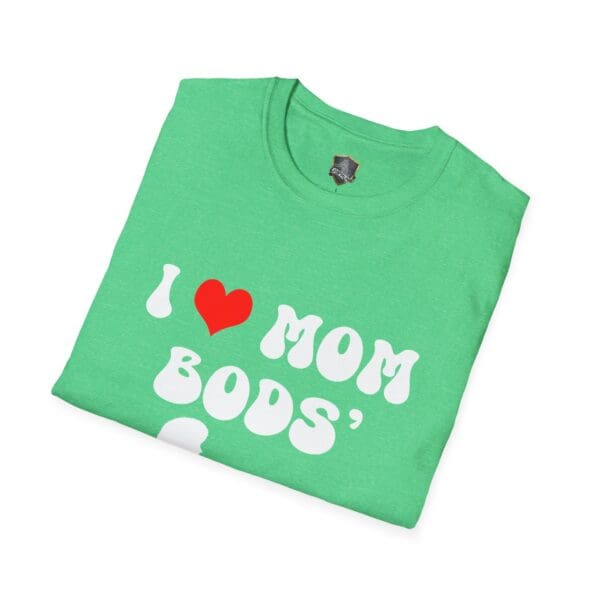 A folded green t-shirt featuring the text "I ❤️ MOM BODS" in bold white letters.