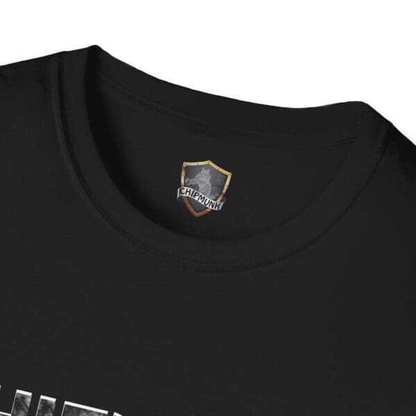 Close-up of the neckline of a black T-shirt, featuring a shield-shaped logo and "CHIPMUNK" printed at the back of the collar from the Chipmunk Rock T-Shirt #6 collection.