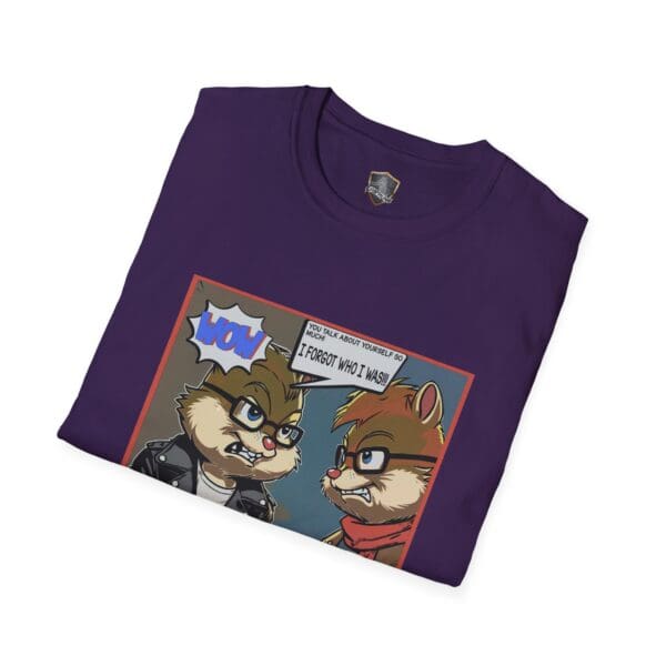 Folded purple t-shirt titled "Overt Narcissism - Forgetting Myself Graphic Tee," showcasing two cartoon chipmunks; one wears glasses and a leather jacket, while the other sports a red scarf. The speech bubble states, "Wow! You talk about yourself a lot. I forgot who I was.