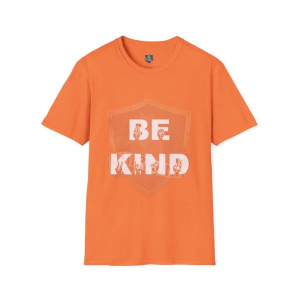 An orange t-shirt known as the "Be Kind in Sign Language T-Shirt" has the text "BE KIND" in white, accompanied by a subtle shield design in the background.