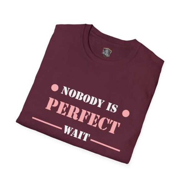 A folded maroon "Nobody Is Perfect" Statement T-Shirt with bold pink and white lettering.