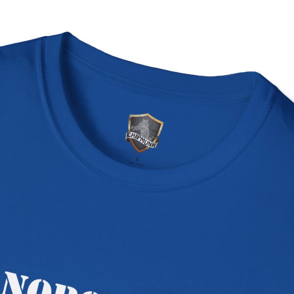 Close-up of a blue "Nobody Is Perfect" Statement T-Shirt displaying the neckline and inside label featuring a Chipmunk logo. The text on the shirt begins with "NOR," partially visible.