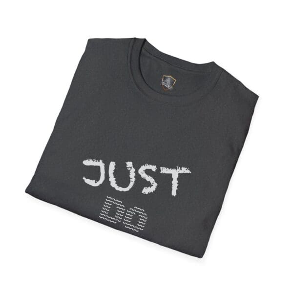 A folded black T-shirt with "JUST DO YOUR JOB!" printed in white on the front.