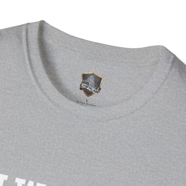 Close-up of the "I Would Cuddle You So Hard" T-shirt in gray, featuring a shield logo and the word "Chipmunk" on the inside collar label.