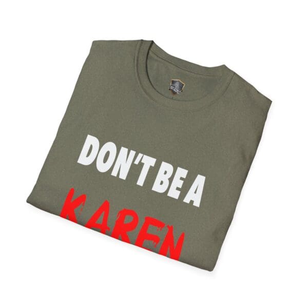 A folded green T-shirt labeled "Don't Be a Karen," featuring bold white and red lettering.