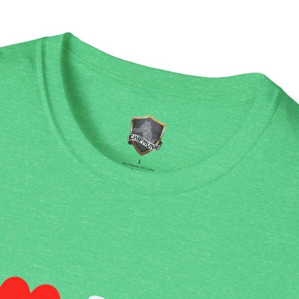 Close-up of a green T-shirt collar with a label displaying a shield emblem and the word "I ❤️ Mom Bods" in black text.