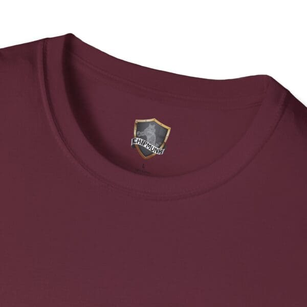 Close-up of a maroon Guiding Star Tee Shirt featuring the Chipmunk brand logo printed inside the collar.