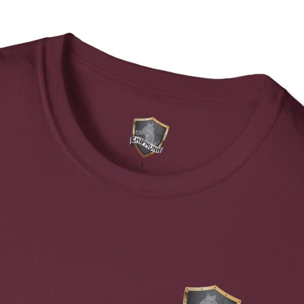 Close-up of the collar of a Chipmunk Family T-Shirt in maroon, displaying a crest design tag with a shield and the word "Chipmunk.