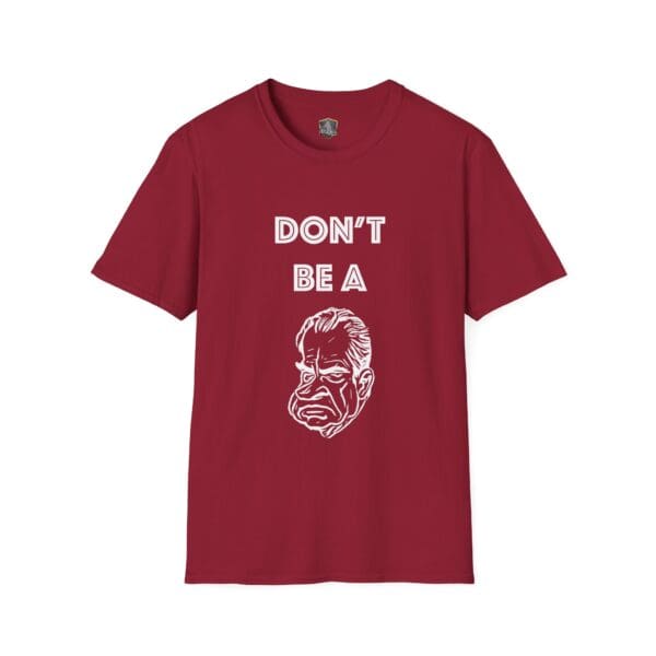 Maroon Don't Be A... Tee featuring white text and an illustration of an angry face below.