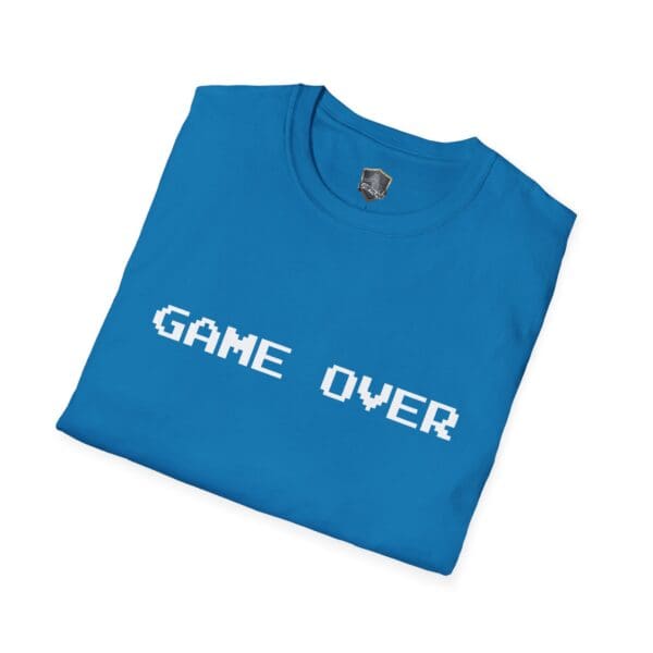 Game Over T-Shirt in blue, featuring the phrase "GAME OVER" in white pixelated font, folded neatly.