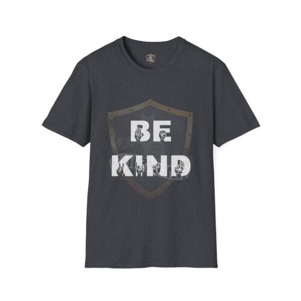 Dark gray T-shirt with a shield design prominently displaying the words "Be Kind" in bold white letters.