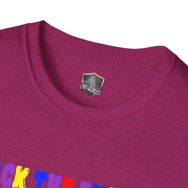 Close-up of the collar on a magenta Colorful Angry Unicorn Tee, featuring a small black and gold Chipmunk shield logo label.