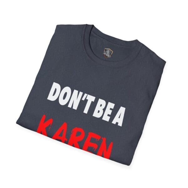 A folded dark "Don't Be a Karen" T-Shirt with the text printed in white and red.