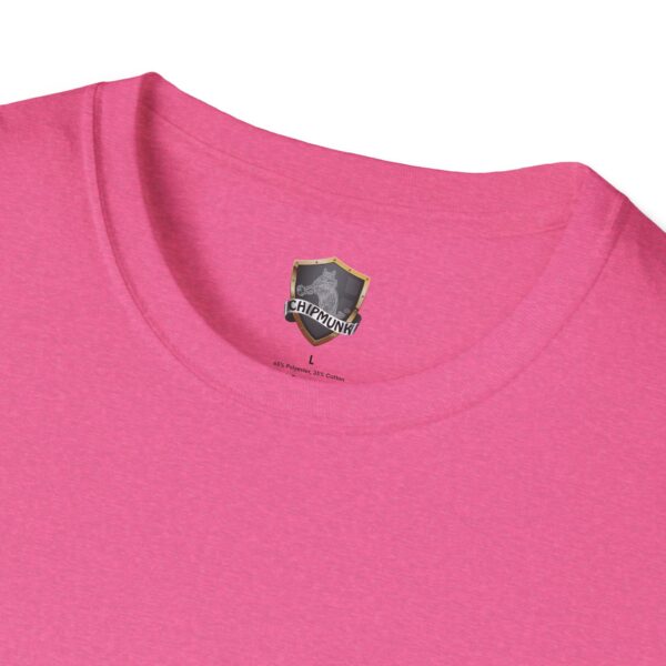 A close-up view of the collar area of a pink George the Roadie's Iconic Icebreaker T-Shirt: 'I Didn't Do It! I Was Framed!!! reveals a black and gray shield logo and the word "Chipmunk," with the size labeled as "L" on the inside.