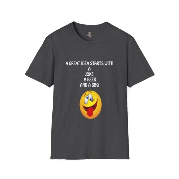 The Great Idea T-Shirt features a dark gray design with a yellow smiley face playfully sticking its tongue out, accompanied by the text "A GREAT IDEA STARTS WITH A JOKE, A BEER AND A BBQ" above it.