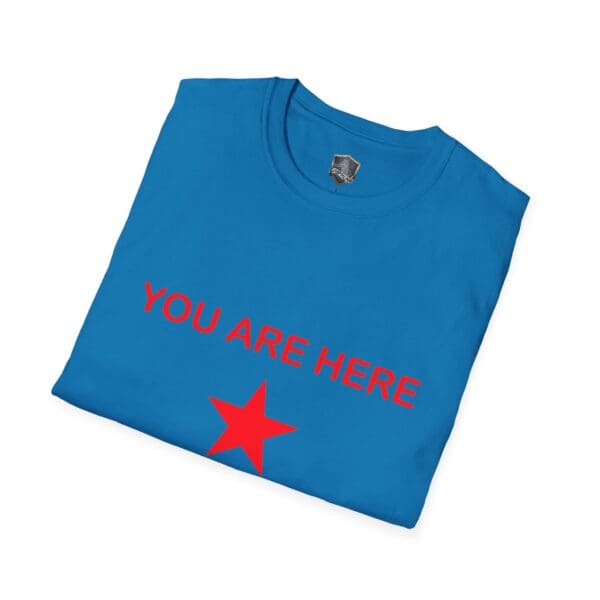 A Guiding Star Tee Shirt featuring a blue color with the text "YOU ARE HERE" and a red star printed on it.