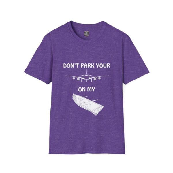 Purple T-shirt featuring a graphic of an airplane with a baguette and the text "Don't park your [plane] on my [baguette]" from the Don't Park Your Plane On My Dingy T-Shirt collection.