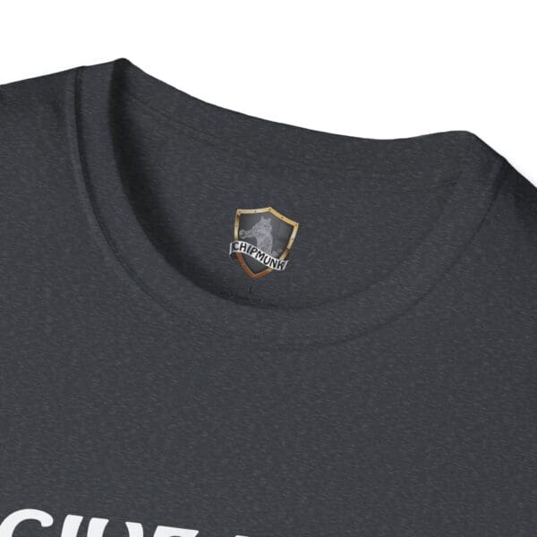 Close-up of a dark gray "Give Me The Tips" t-shirt collar with a "Chipmunk" logo design on the inside tag.