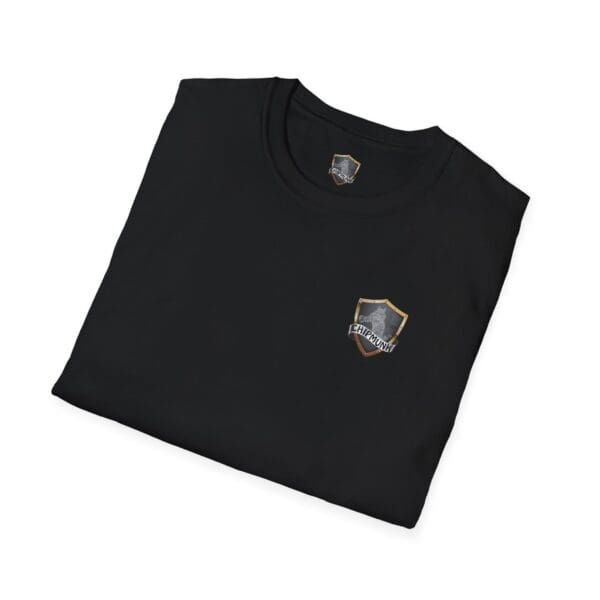 Folded F*ck Cancer Ribbon T-Shirt in black, showcasing a small shield emblem on the chest with a gold and gray design.