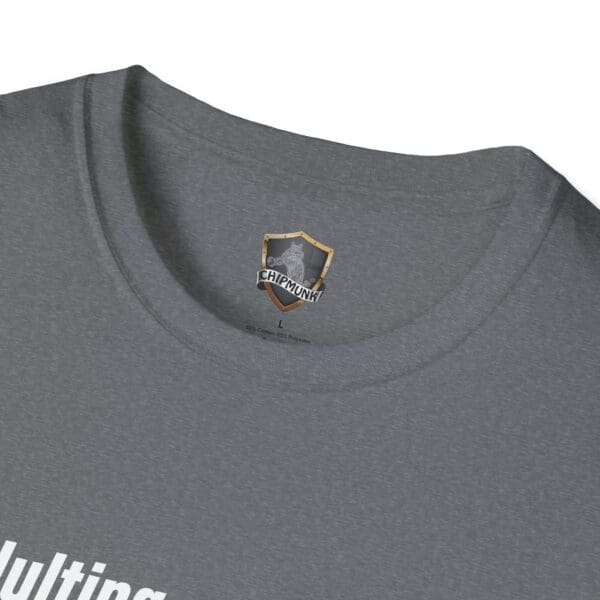 Close-up of a gray collar on the Adulting 1-Star Review T-Shirt featuring a Chipmunk logo with a shield design. Part of the white text is visible on the fabric.