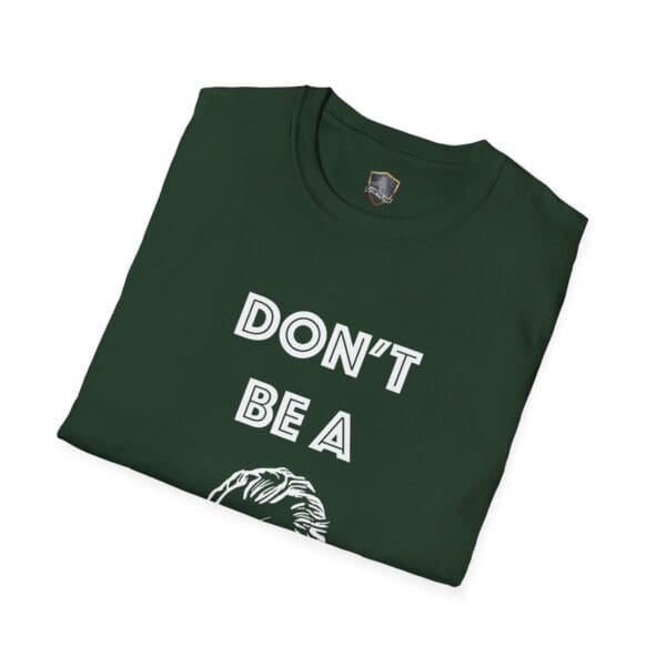 A folded green "Don't Be A... Tee" featuring white text reading "DON'T BE A" above a partial graphic of a face.