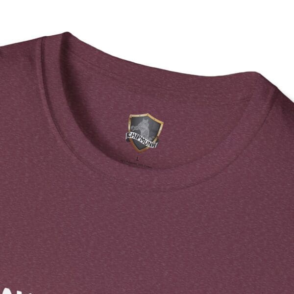 Close-up of a maroon collar featuring a Chipmunk brand tag with a shield logo on the "Don't Park Your Plane On My Dingy T-Shirt".