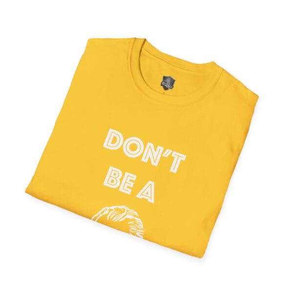 Folded yellow "Don't Be A... Tee" with the text "DON'T BE A" in white. Design partially visible below.