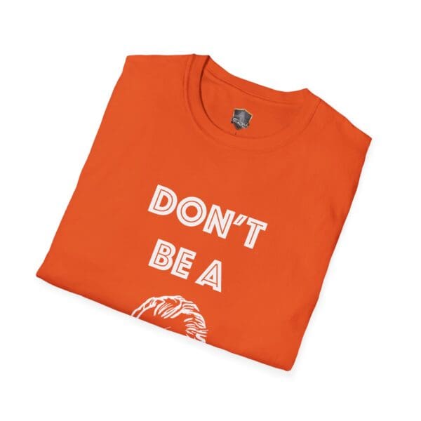 Folded Don't Be A... Tee in orange, featuring partial white text saying "DON'T BE A" above an incomplete graphic.