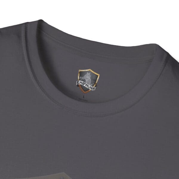 Close-up of a gray "What I Forgot You Will Never Know" T-shirt, featuring a tag inside the collar that shows a shield emblem, the word "Chipmunk," size "L," and "100% Cotton" details.