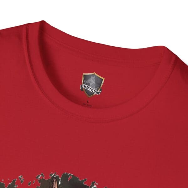 Close-up of the neck area of a red OG Chipmunk T-Shirt, featuring a Chipmunx logo label and a printed design with small figures near the collar.