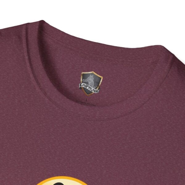 Close-up of a maroon No One Cares T-Shirt with a neckline label displaying a shield logo and the word "CHIPMUNK." A partial view of a yellow pattern is visible at the bottom.