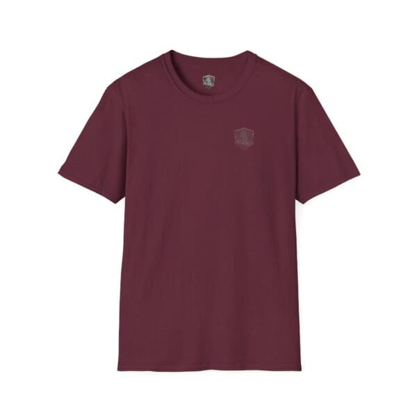 The "You Saw It Because We Brought It" T-shirt is a plain maroon short-sleeve tee featuring a small embroidered emblem on the left chest.