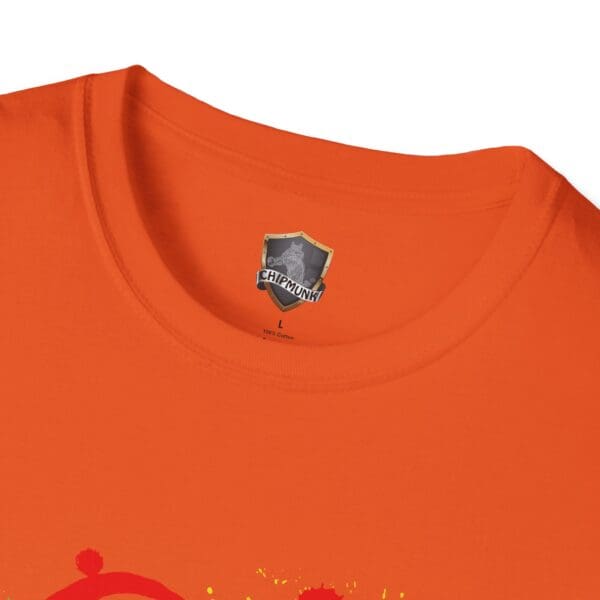 Close-up of the neckline of an orange Splash Chipmunk T-shirt, featuring a "Chipmunk" brand label with a shield graphic. The shirt is 100% cotton and size large.