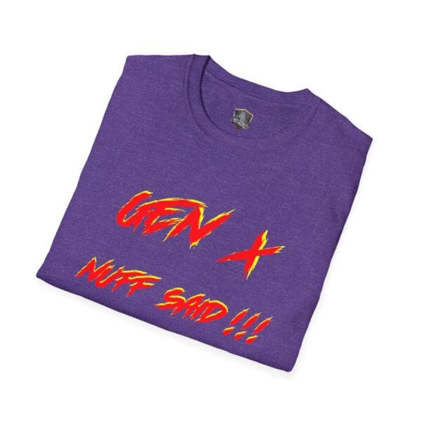 A folded purple Gen X T-shirt featuring red and yellow text that reads "NUFF SAID!!!".