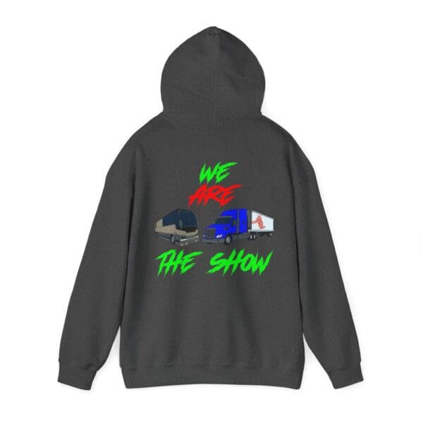 Introducing "The Show Hoodie," a dark hoodie adorned with a bus and truck design, featuring the phrase "We Are The Show" in bold red and green letters.