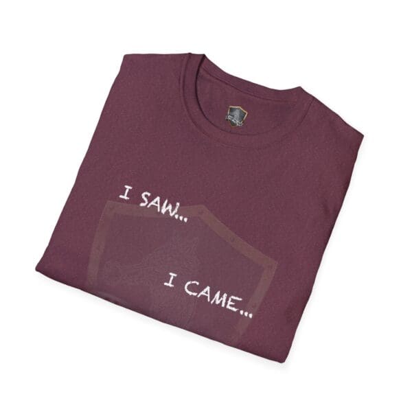 Folded maroon "I Saw T-Shirt" with the text "I SAW... I CAME..." printed on the front, complemented by a subtle shield design in the background.