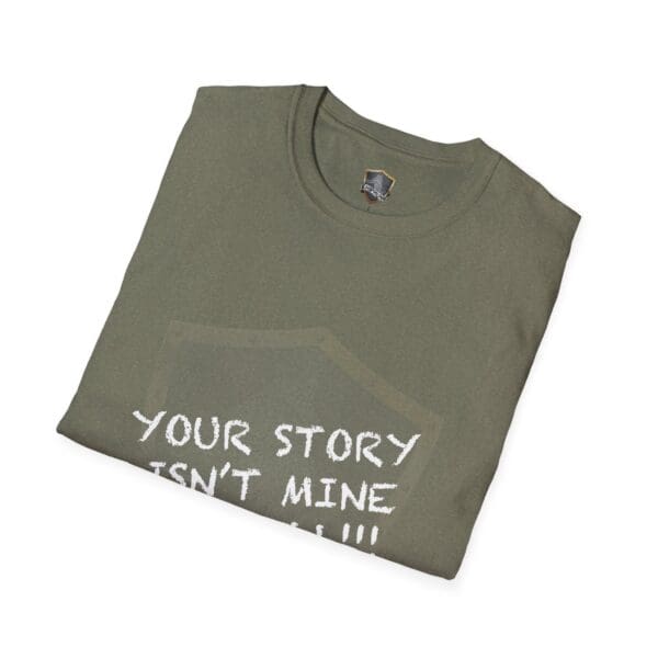 A folded olive green t-shirt featuring the text "Your Story Is Not Mine to Tell," with some of the white letters partially visible.