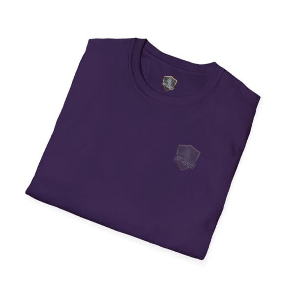 Folded "You Saw It Because We Brought It" purple t-shirt featuring a small shield logo on the chest.