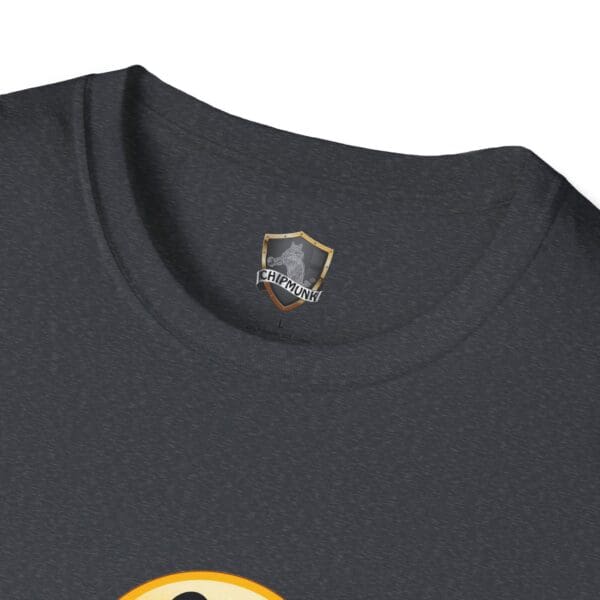 Close-up of the No One Cares T-shirt in dark gray, featuring a small logo with a shield and the word "Chipmunk" inside the collar.