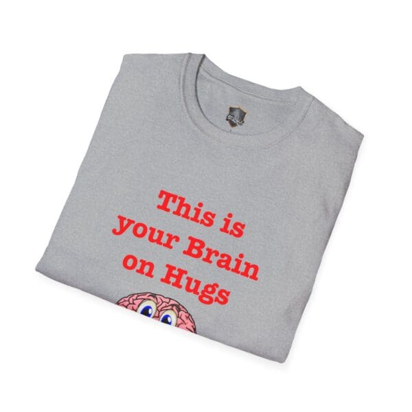 The gray 'This is Your Brain on Hugs' T-shirt is folded, featuring text that reads "This is Your Brain on Hugs" above a cartoon brain illustration.