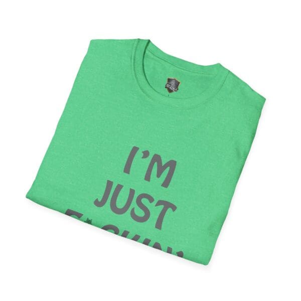 Green folded T-shirt featuring the partial text "I'M JUST..." from the I'm Nuts T-Shirt collection.