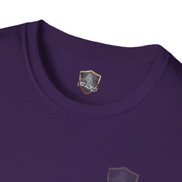 A close-up of the You Saw It Because We Brought It T-Shirt in purple, featuring a Chipmunk logo tag on the inside collar, with a shield design.