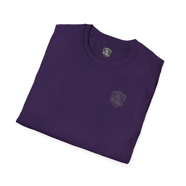 A folded purple "You Bought It Because We Brought It" t-shirt featuring a small shield logo on the chest.