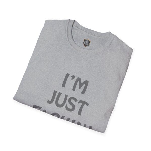 Gray folded t-shirt with the partial text "I'M NUT..." visible.