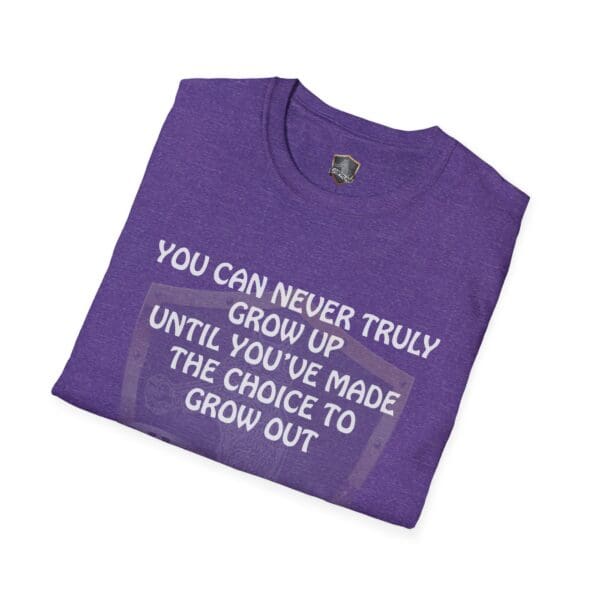 You Can Never Truly Grow Up T-Shirt in purple featuring the text: "You can never truly grow up until you've made the choice to grow out.