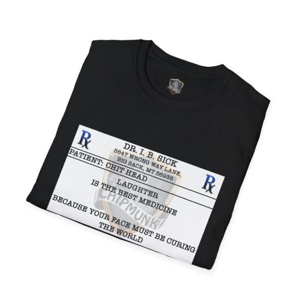 A folded Laughter T-Shirt in black features a funny fake prescription label that states: "Dr. I.B. Sick, laughter is the best medicine because your face must be curing the world.