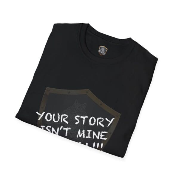 Folded black "Your Story Is Not Mine to Tell" t-shirt featuring a shield graphic and white lettering.