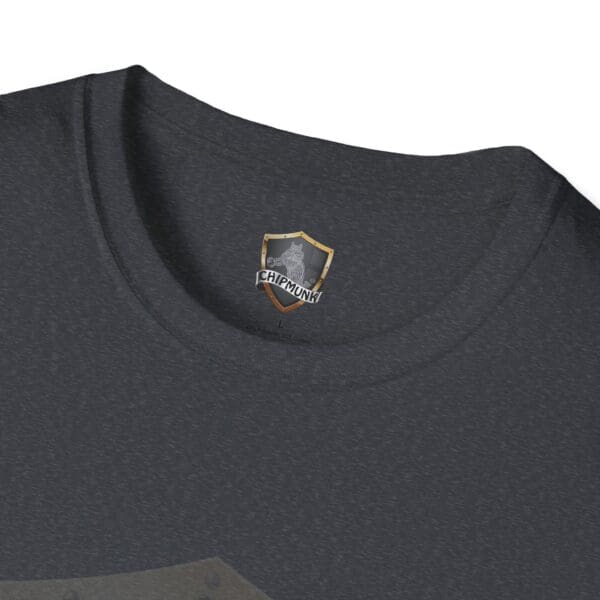 Close-up of the "Hear The Stupid T-Shirt," showcasing a dark gray design with a "Chipmunk" logo featuring a shield and helmet near the neckline.