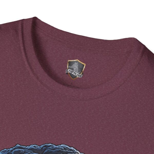 A close-up of the collar of a maroon "Not My Nuts" T-shirt by Chipmunk, showcasing a label with a visible shield logo.