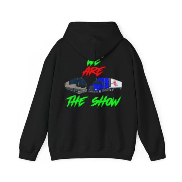 Black hoodie featuring a graphic of a tour bus and semi-truck, with "We Are The Show" in red and green text. Product: The Show Hoodie.